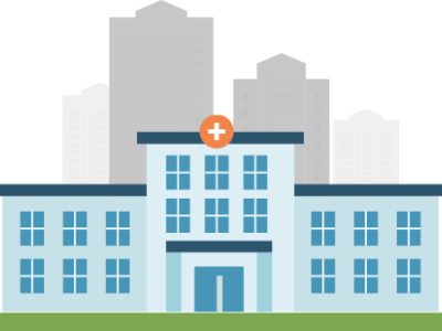 A big hospital with a city in the background